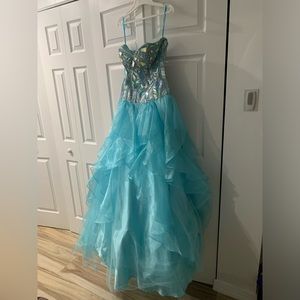 Stunning crystal blue prom or quinceañera dress 
Fits like a small